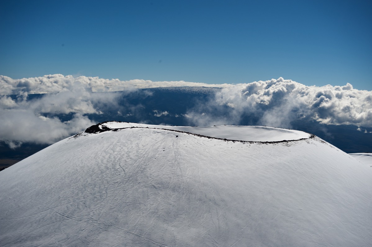Snow on a cinder cone at the summit of Mauna Kea on the big island of Hawai`i